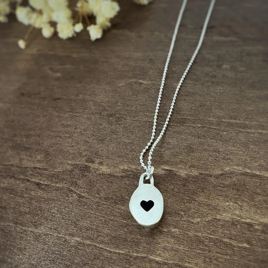 all the collection wear a little heart on back sea glass