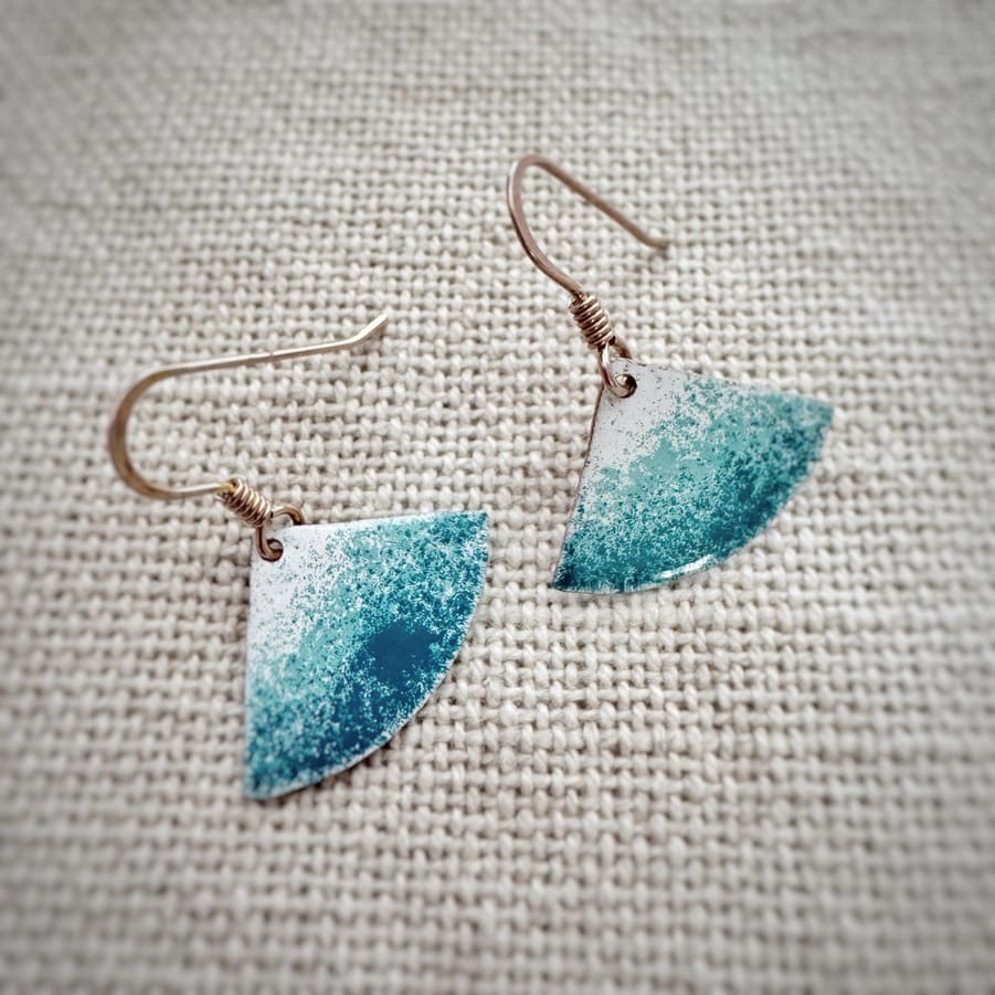 Handcrafted turquoise fan earrings made with copper, low-temperature enamels and sterling silver hooks. Contemporary artisan jewelry inspired by crystal-clear ocean waters.