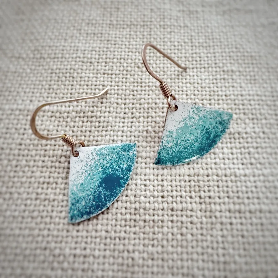 Handcrafted turquoise fan earrings made with copper, low-temperature enamels and sterling silver hooks. Contemporary artisan jewelry inspired by crystal-clear ocean waters.